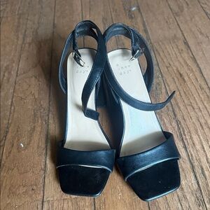 Tried on once, black chunk heels with open toe.